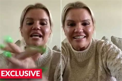 Kerry Katona strips topless as she exposes boobs and booty for。